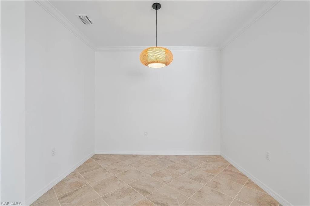 Neutral-toned tile flooring, white walls, and a woven pendant light fixture