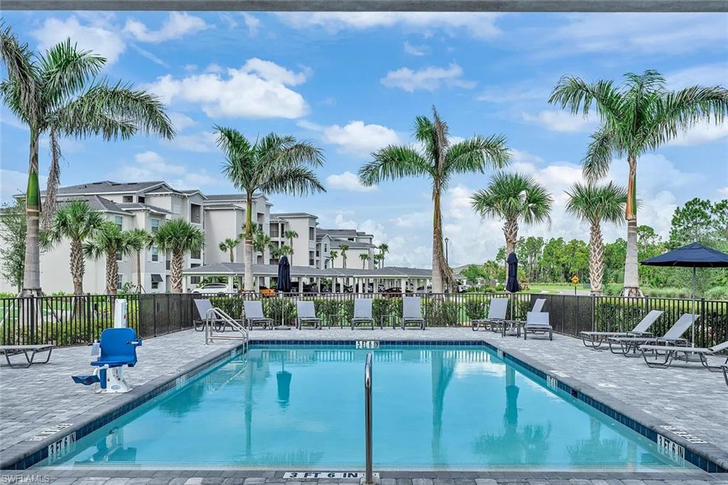 Rectangular swimming pool with a paver deck surround