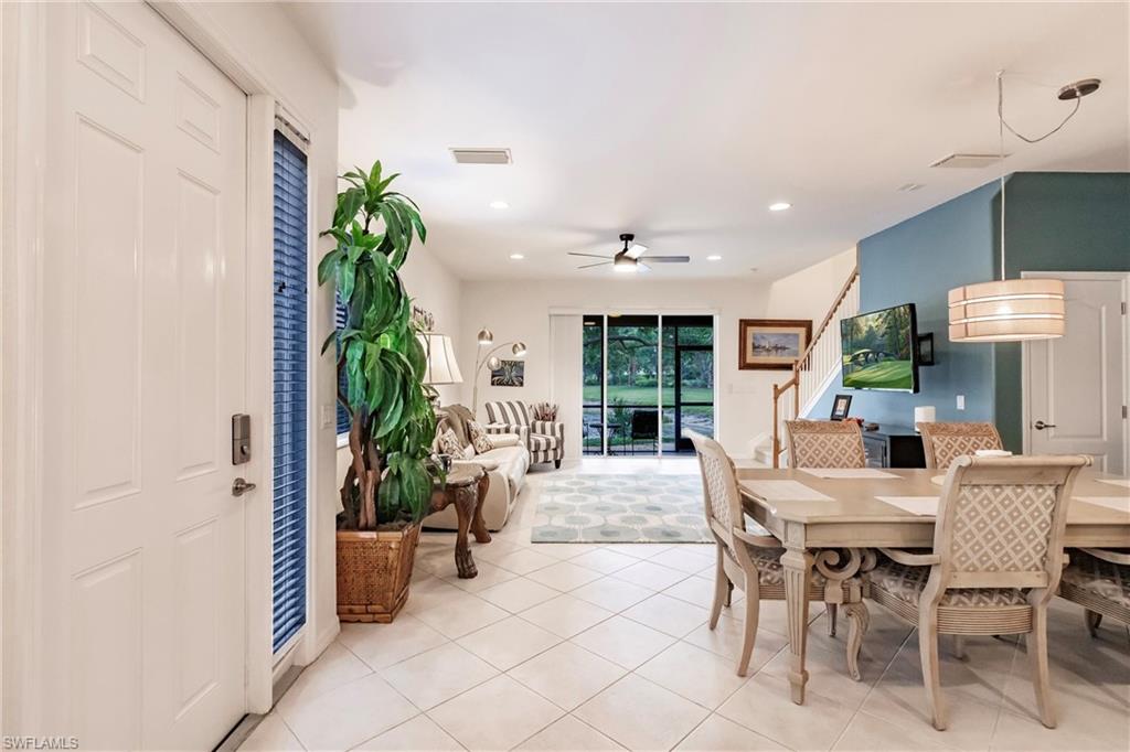 Dining space featuring a ceiling fan, light tile patterned floors, and recessed lighting