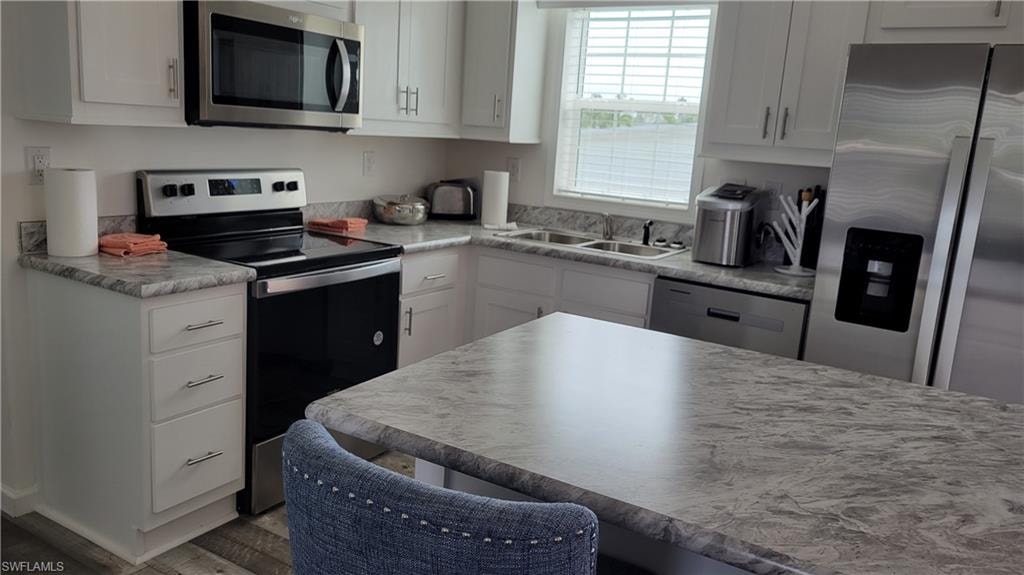 View of kitchen over island