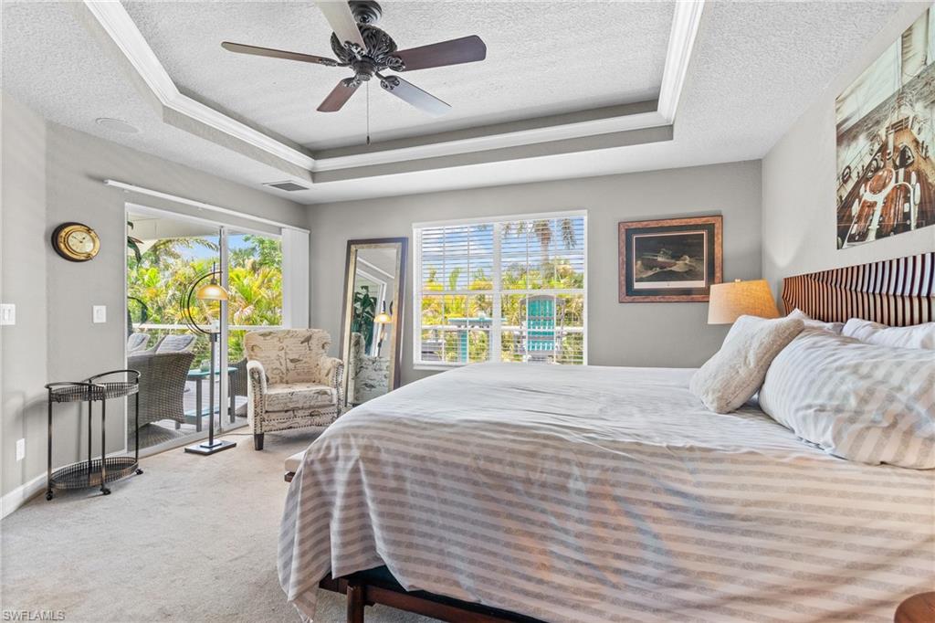 Primary Bedroom with sliders to the lanai
