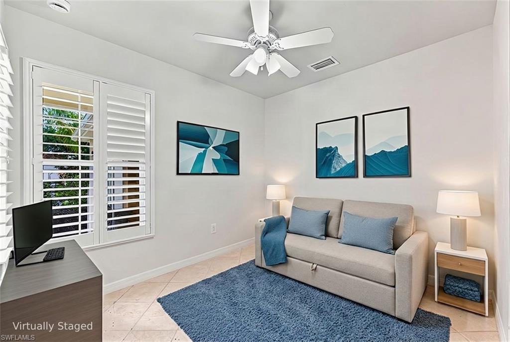 Virtually staged Bedroom 3 with a pull-out sleeper sofa