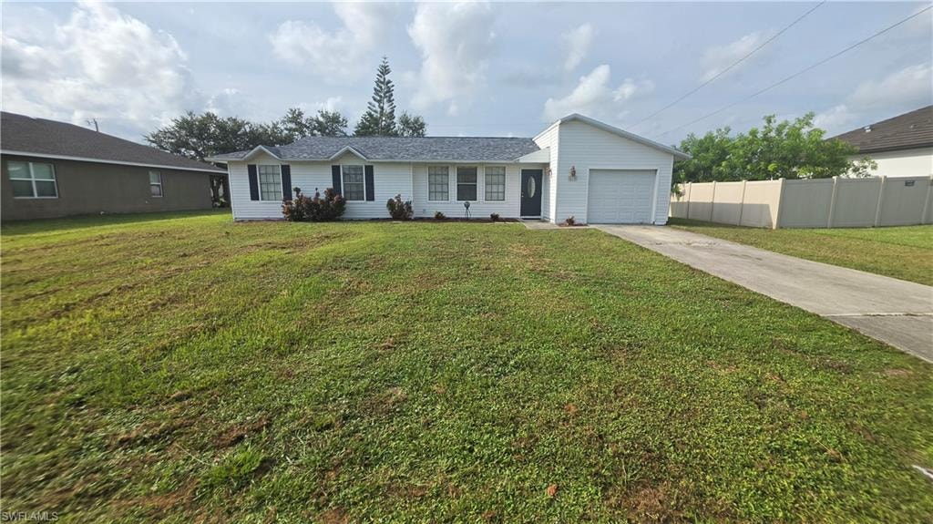 White exterior with black shutters and a light gray shingle roof