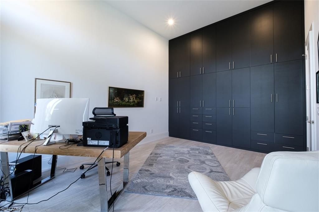 guest room with lots of space in the builtin cabinets