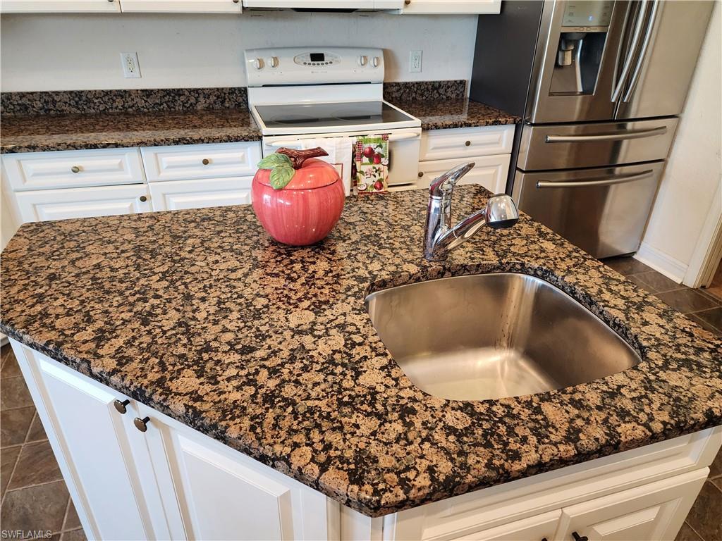 beautiful center island with vegetable sink