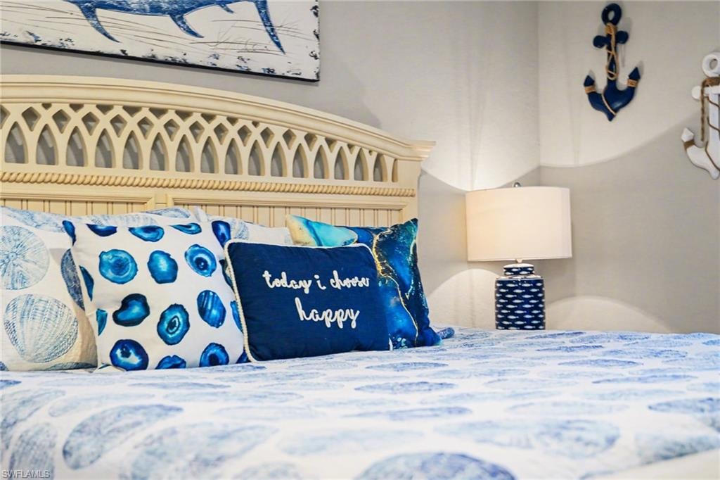 Decorative headboard with intricate lattice detailing and beadboard paneling