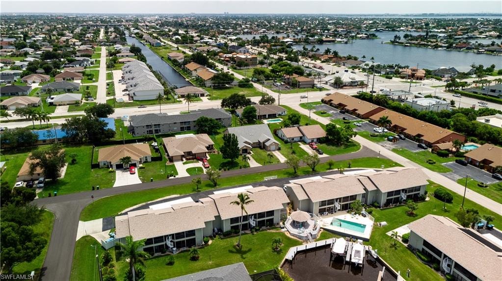 Waterfront residential community featuring a canal system and numerous properties with private boat docks