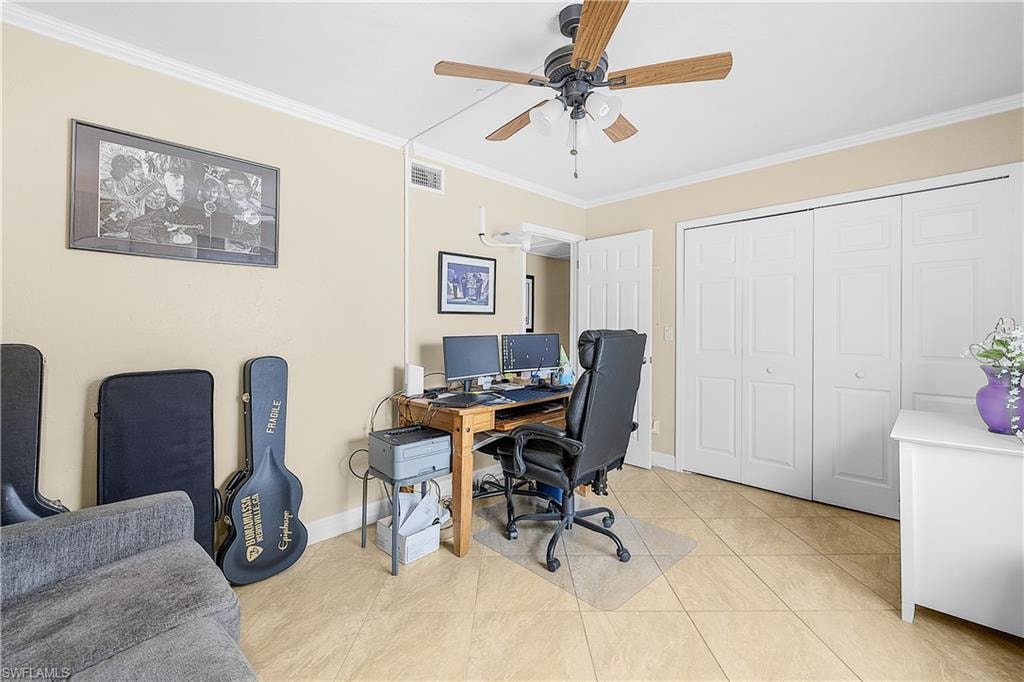 Neutral-toned walls complemented by crown molding and baseboards