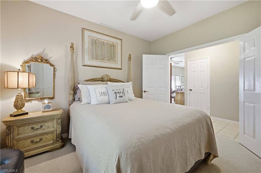 Bedroom featuring neutral wall colors and carpet flooring