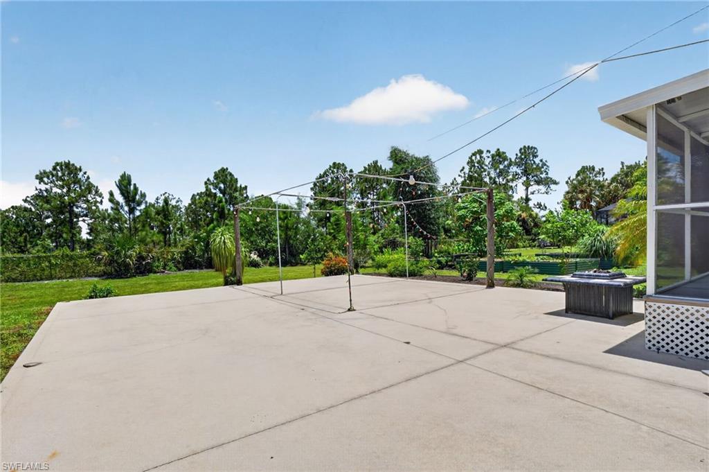CONCRETE AREA FOR BBQ, BASKETBALL AND OTHER ACTIVITIES