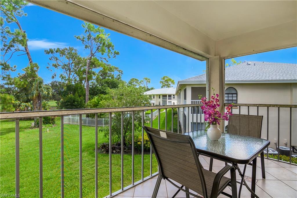 End unit with open views of the golf course and community