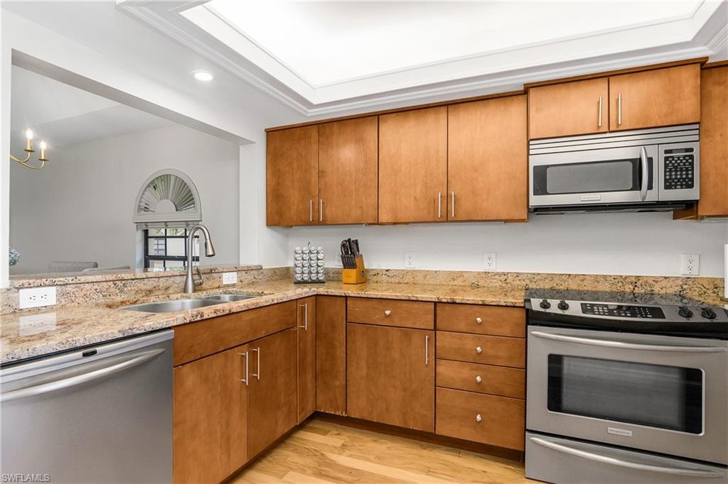 Additional views of the kitchen with views into the dining and living room