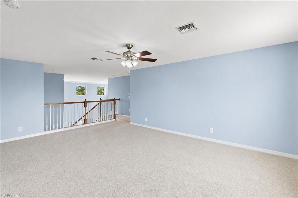 Up the grand staircase you will find a large loft space.
