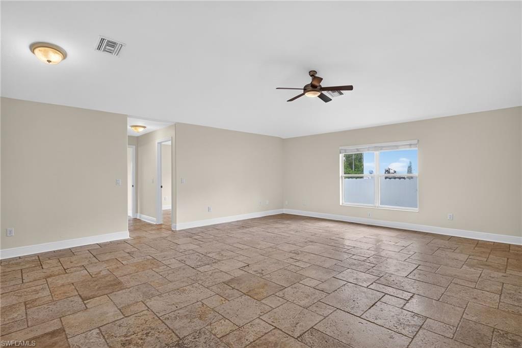 Rear living room, possible conversion to 4th bedroom or study