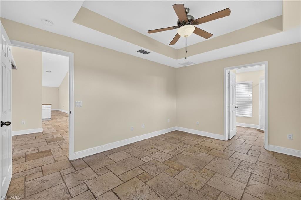 Master bedroom with master bath on right and dining room on left