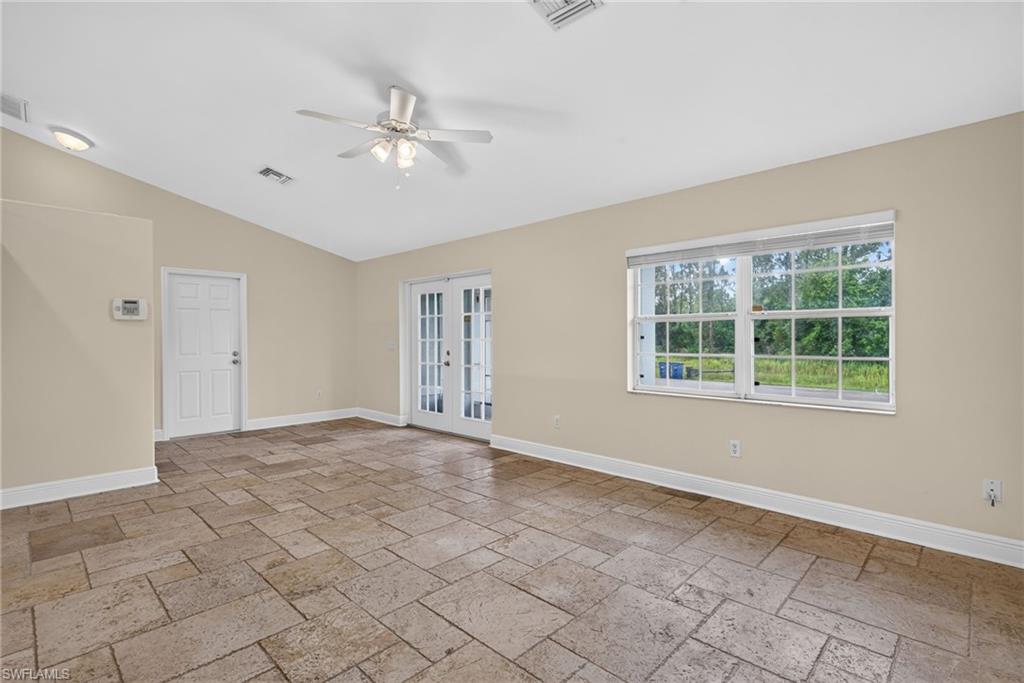Entryway, white door leads to garage