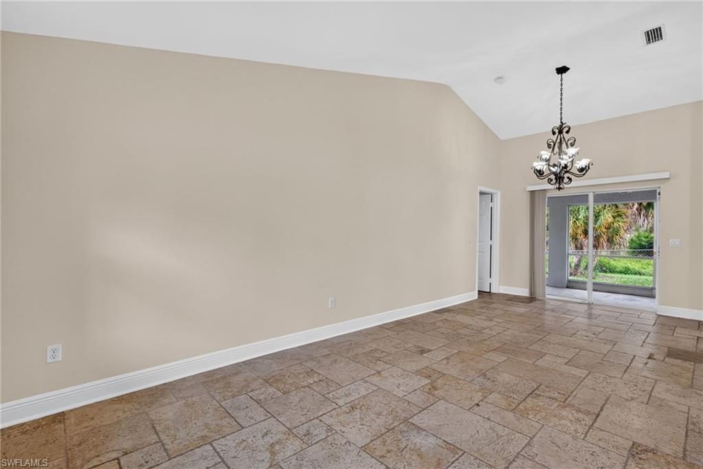 Dining room, left leads to master, right to kitchen, and sliders to lanai