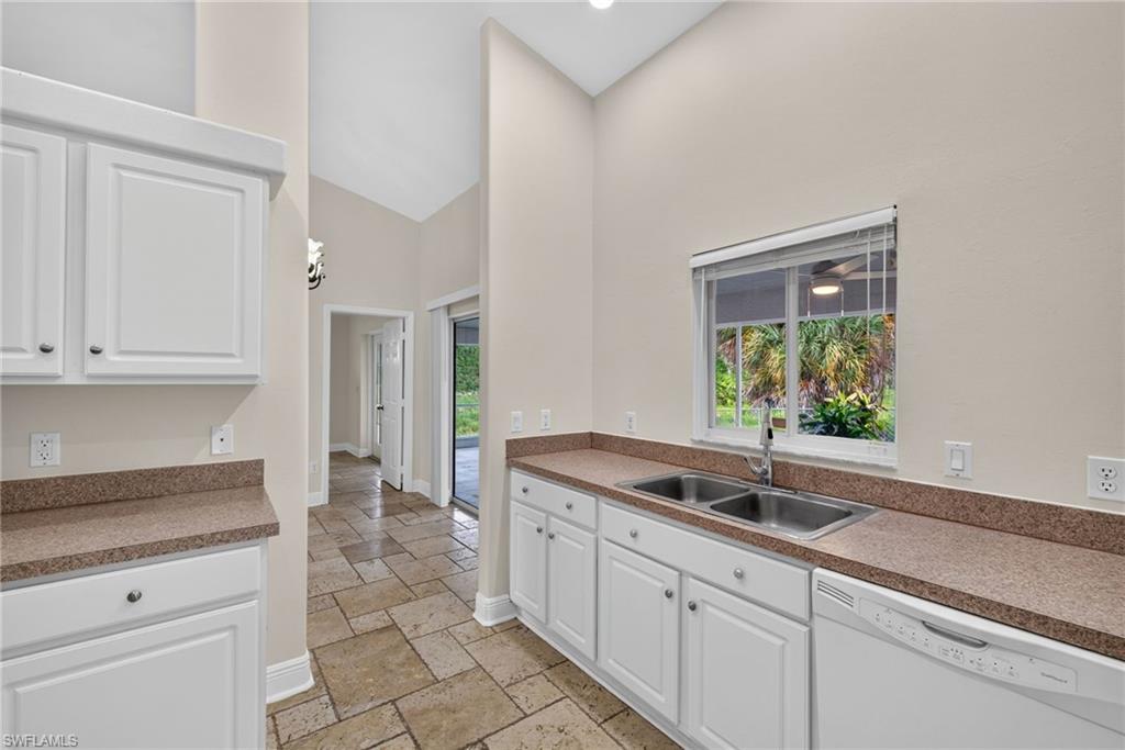 Kitchen with dining room beyond