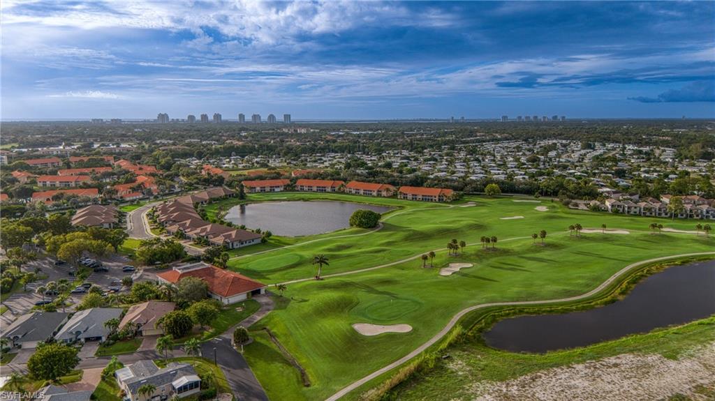 Expansive golf course property featuring multiple fairways, sand traps, and water features