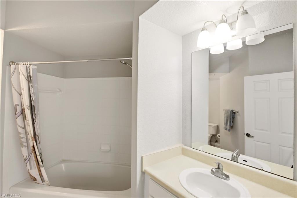 Full bathroom featuring vanity and shower / tub combo