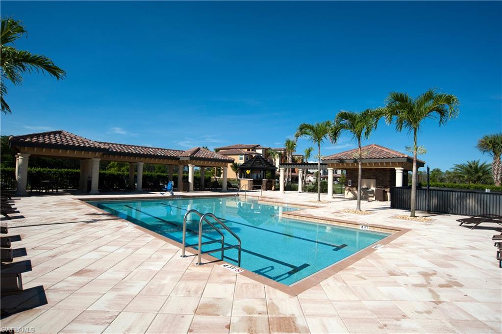 Rectangular swimming pool with integrated lane lines and entry handrails