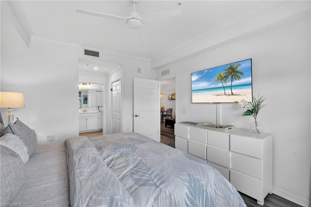 Bedroom with crown molding, ceiling fan, and recessed lighting
