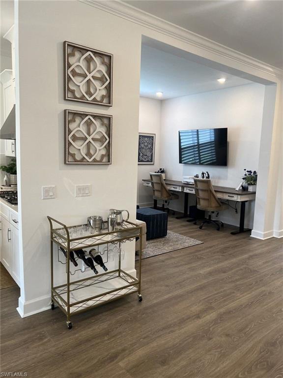 Open floor plan living provides room for special features like a bar cart