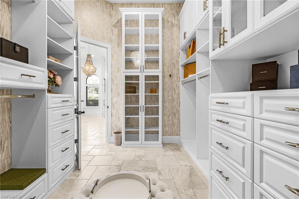 Her custom closet system in primary bath
