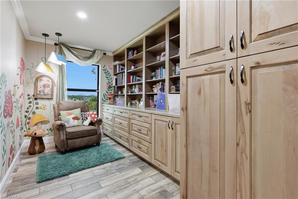 Custom built-in shelving and cabinetry with ample storage