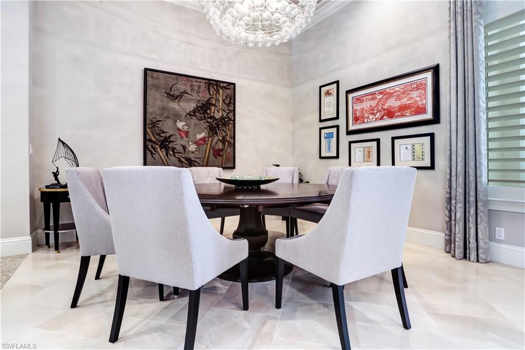 Polished tile flooring complements the room's elegant wall finishes