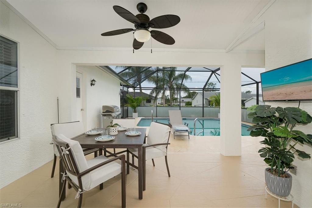 Outdoor Living Space with TV, Room to Entertain & Dine