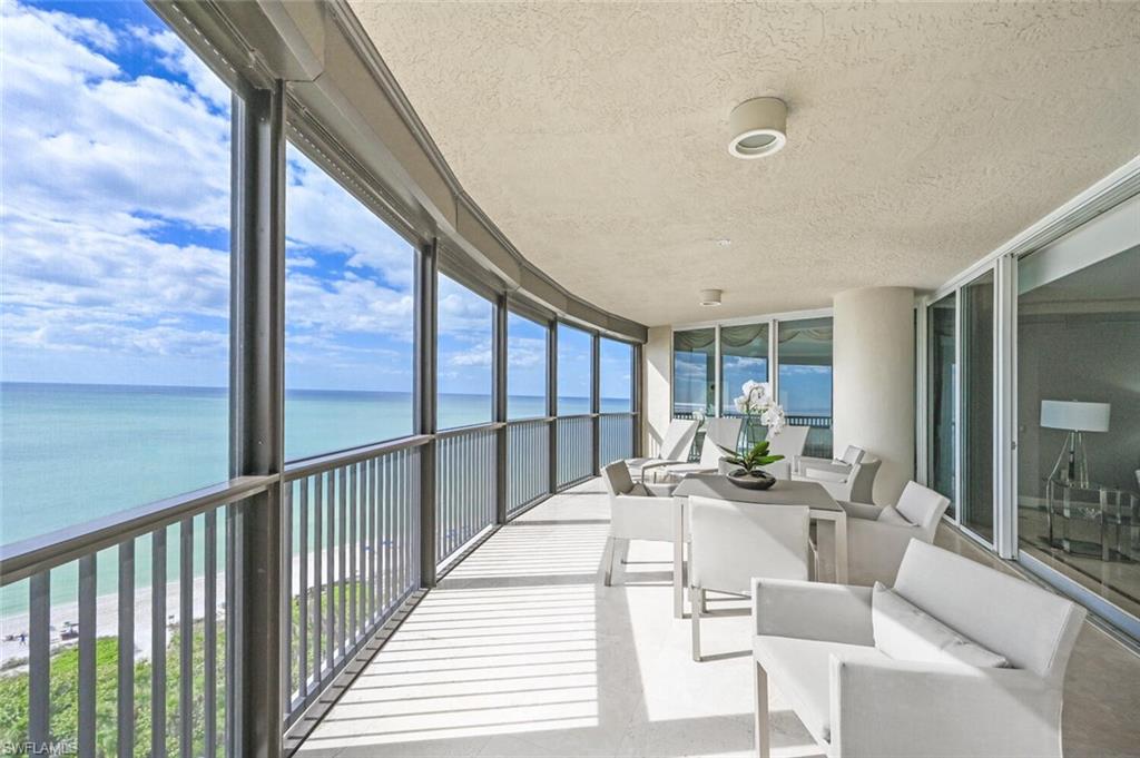 Expansive private balcony with continuous water frontage