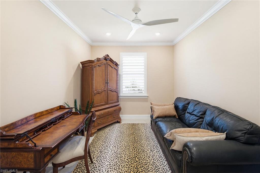 Office area featuring ornamental molding, a ceiling fan, and recessed lighting