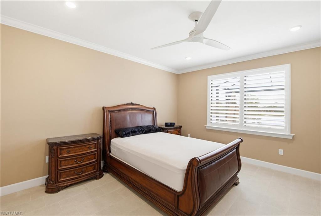 Bedroom featuring crown molding, ceiling fan, and recessed lighting
