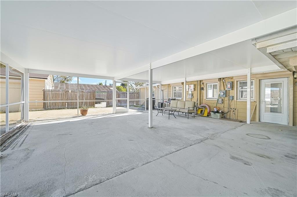 Fenced backyard with a patio