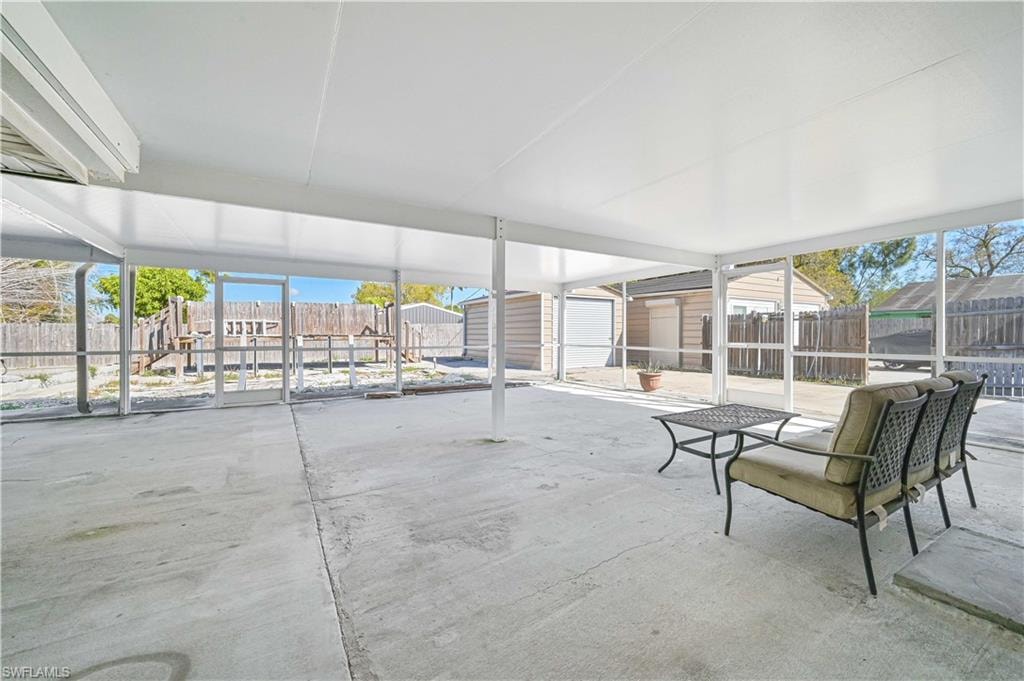 Sunroom featuring plenty of natural light