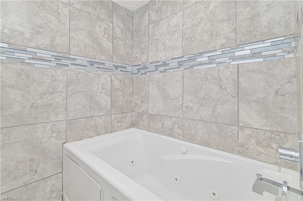 Bathroom featuring a jetted tub