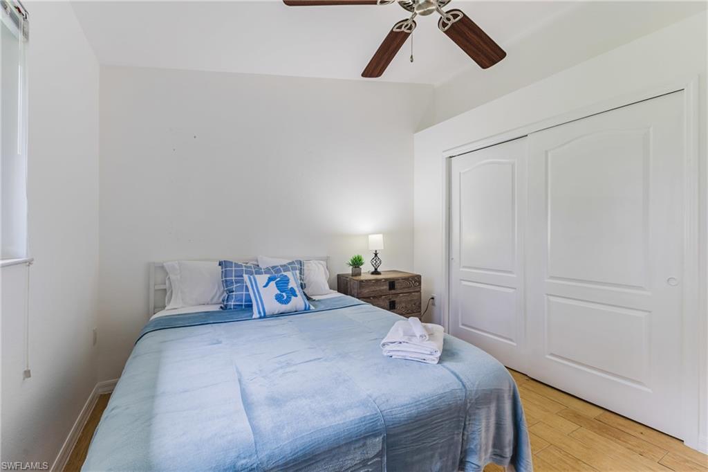 Bright interior space featuring light wood plank tile flooring