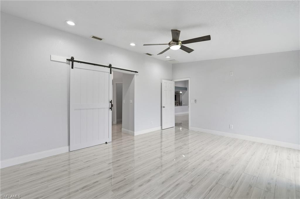 Barn Door provides privacy from the bedroom to the primary bathroom.