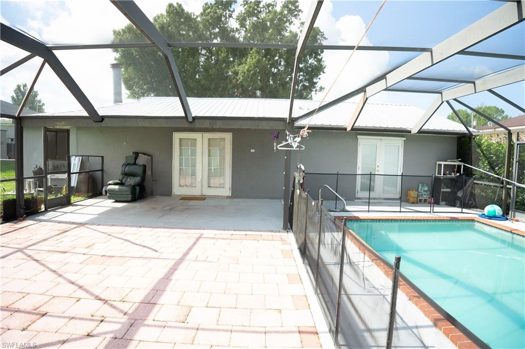 Pool with Extended Paver Lanai-Screened.