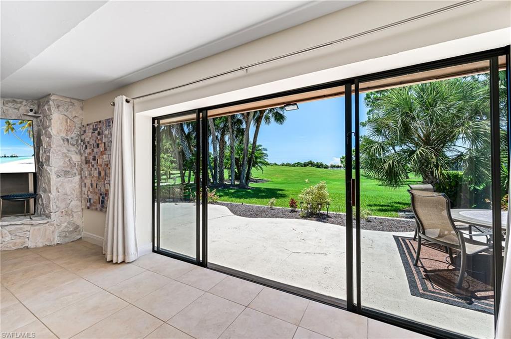 Full wall sliders to patio and golf course view