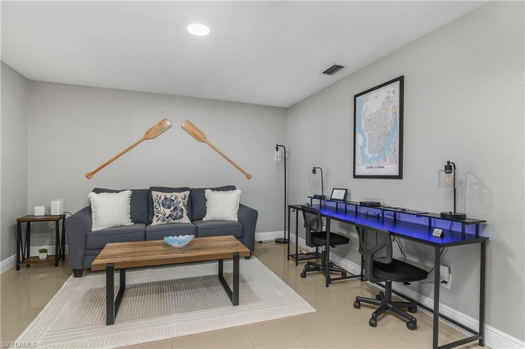 Bright interior space featuring light-toned flooring and neutral wall finishes