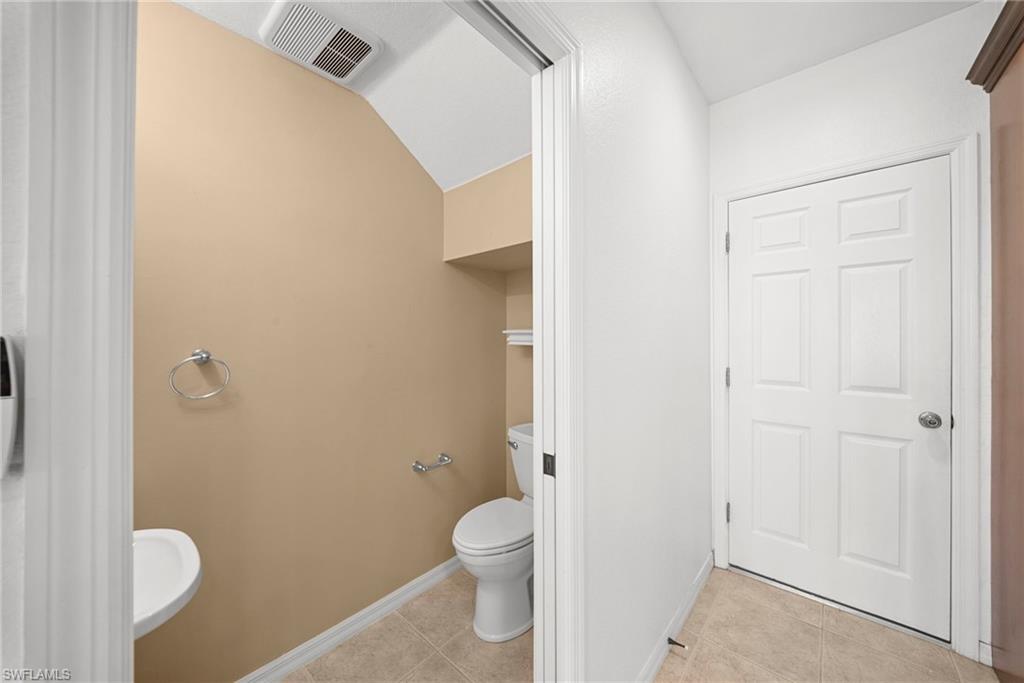 half bath by kitchen