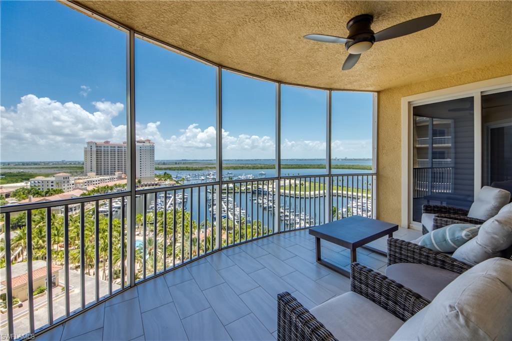 Curved balcony with full-height screened enclosure