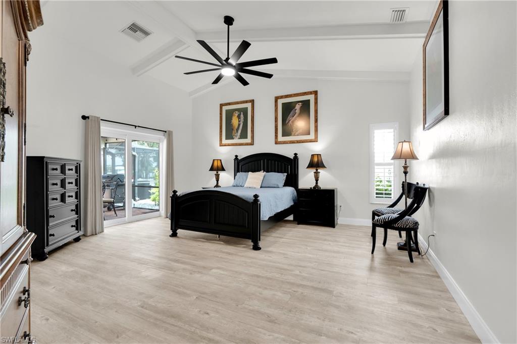 The Oversized Master Bedroom With A Double Hurricane Slider Out To The Covered Pool Area/Lanai!