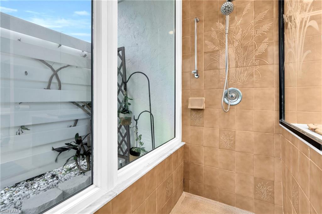 The Master Bathroom Shower Is Private Glass Enclosed Shower That Has A View Of The Outdoors!
