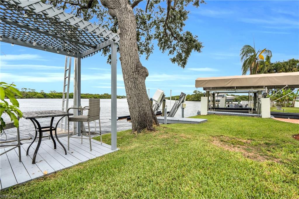 This Unit Comes With Jet Ski Lifts & Kayak Lifts And A Private Seating Area On The River!