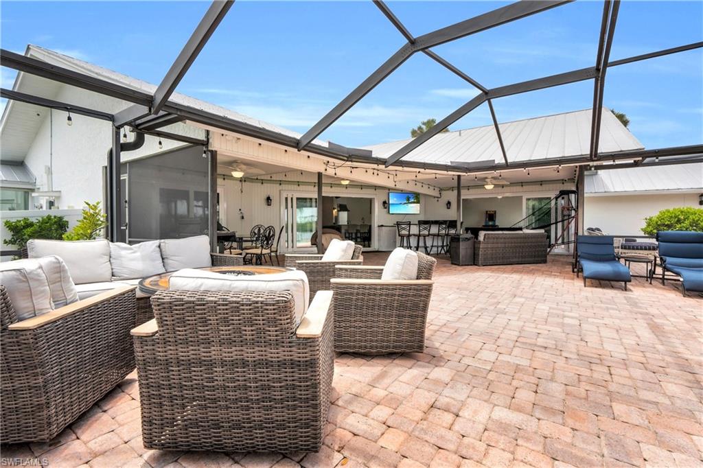 The Pool Area & Lanai Have Plenty Of Covered And Uncovered Areas To Sit And Enjoy The River Views In Any Kind Of Weather With Lighted Areas, Firepits, And Games! Great For Family Outings Or Use As A Rental Unit!