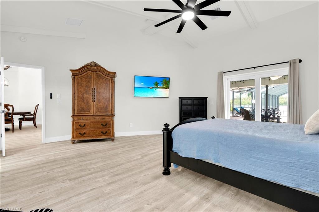 The Oversized Master Bedroom With A Double Hurricane Slider That Leads Out To The Covered Pool Area/Lanai!