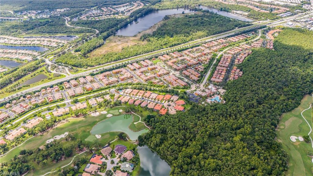 Expansive residential community featuring a golf course, multiple lakes, and extensive green spaces